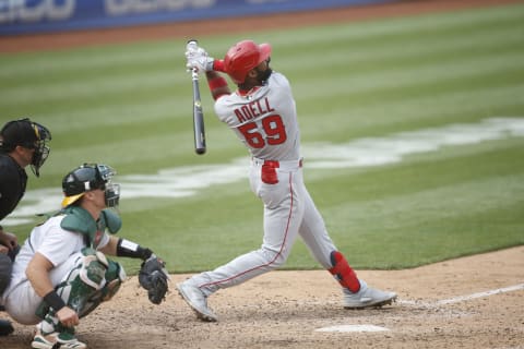 OAKLAND, CA – AUGUST 23: Jo Adell #59 of the Los Angeles Angels bats during the game against the Oakland Athletics at RingCentral Coliseum on August 23, 2020 in Oakland, California. The Athletics defeated the Angels 5-4. (Photo by Michael Zagaris/Oakland Athletics/Getty Images)