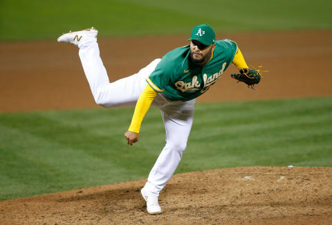 Yusmeiro Petit of the Oakland Athletics pitches in 2020. (Photo by Michael Zagaris/Oakland Athletics/Getty Images)