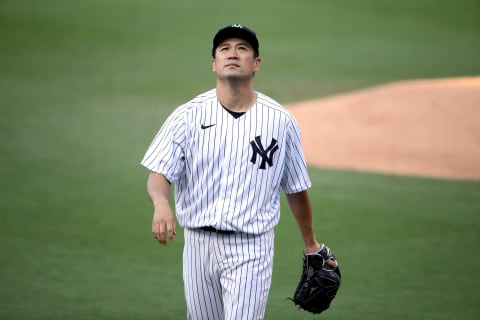 SAN DIEGO, CALIFORNIA – OCTOBER 07: Masahiro Tanaka #19 of the New York Yankees heads back to the dugout against the Tampa Bay Rays during the second inning in Game Three of the American League Division Series at PETCO Park on October 07, 2020 in San Diego, California. (Photo by Christian Petersen/Getty Images)