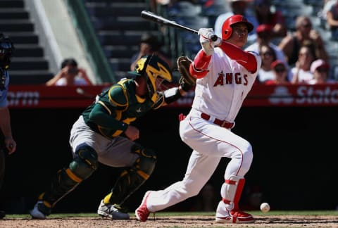 ANAHEIM, CA – SEPTEMBER 30: Shohei Ohtani #17 of the Los Angeles Angels of Anaheim strikes out swinging as catcher Beau Taylor #46 of the Oakland Athletics looks for the ball during the sixth inning of the MLB game at Angel Stadium on September 30, 2018 in Anaheim, California. Ohtani struck out swinging. (Photo by Victor Decolongon/Getty Images)