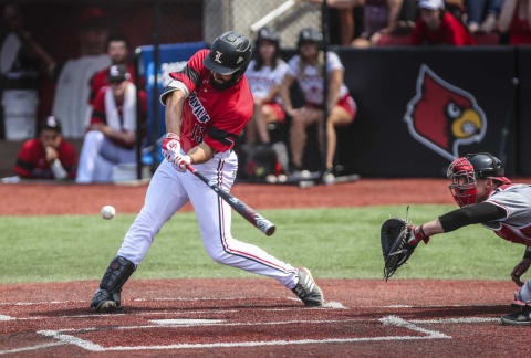 Louisville’s Alex Binelas hits this single in the bottom of the ninth for an RBI to give the Cards the 4-3 win over Illinois State in the 2019 NCAA Regional Monday afternoon. Louisville advances to the Super Regional. June 3, 2019.Louisville Baseball Beats Illinois State In 2019 Regional