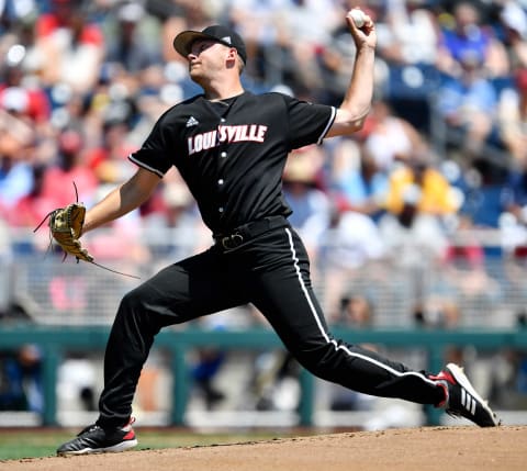 Louisville pitcher Reid Detmers (42) throws in the bottom of the first against Vanderbilt in the 2019 NCAA Men’s College World Series at TD Ameritrade Park Sunday, June 16, 2019, in Omaha, Neb.