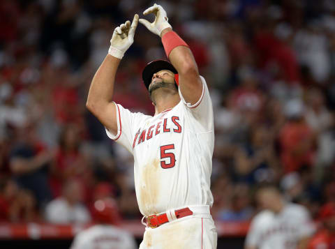 July 27, 2019; Anaheim, CA, USA; Los Angeles Angels first baseman Albert Pujols (5) reacts after hitting a solo home run against the Baltimore Orioles during the sixth inning at Angel Stadium of Anaheim. Mandatory Credit: Gary A. Vasquez-USA TODAY Sports