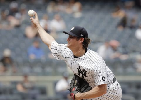 May 22, 2021; Bronx, New York, USA; New York Yankees starting pitcher Gerrit Cole (45) pitches against the Chicago White Sox during the third inning at Yankee Stadium. Mandatory Credit: Andy Marlin-USA TODAY Sports