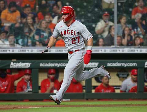 Los Angeles Angels center fielder Mike Trout (27) runs towards home plate to score a run during the fourth inning against the Houston Astros. Mandatory Credit: Troy Taormina-USA TODAY Sports