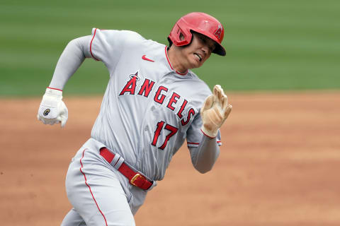 May 29, 2021; Oakland, California, USA; Los Angeles Angels designated hitter Shohei Ohtani (17) rounds third base to score a run against the Oakland Athletics during the fifth inning at RingCentral Coliseum. Mandatory Credit: Darren Yamashita-USA TODAY Sports