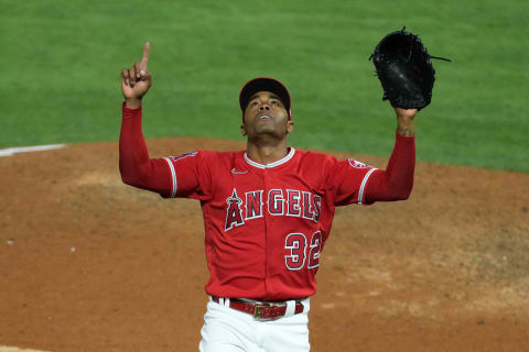 Jun 4, 2021; Anaheim, California, USA; Los Angeles Angels relief pitcher Raisel Iglesias (32) celebrates at the end of the seventh inning against the Seattle Mariners. Mandatory Credit: Kirby Lee-USA TODAY Sports