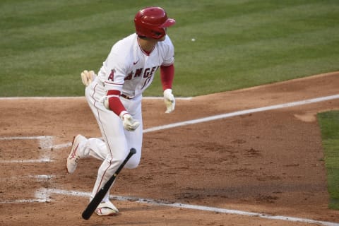 Los Angeles Angels designated hitter Shohei Ohtani (17) tosses his bat after hitting a single during the third inning against the Kansas City Royals. Mandatory Credit: Kelvin Kuo-USA TODAY Sports