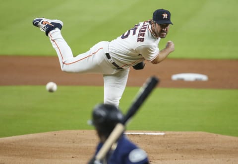 Jul 24, 2020; Houston, Texas, USA; Houston Astros starting pitcher Justin Verlander (35) delivers a pitch during the first inning against the Seattle Mariners at Minute Maid Park. Mandatory Credit: Troy Taormina-USA TODAY Sports