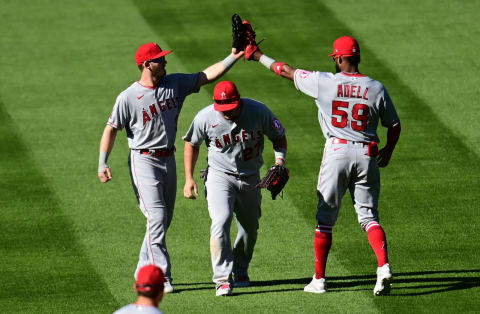 Mike Trout, Jo Adell, Taylor Ward, LA Angels. Mandatory Credit: Ron Chenoy-USA TODAY Sports