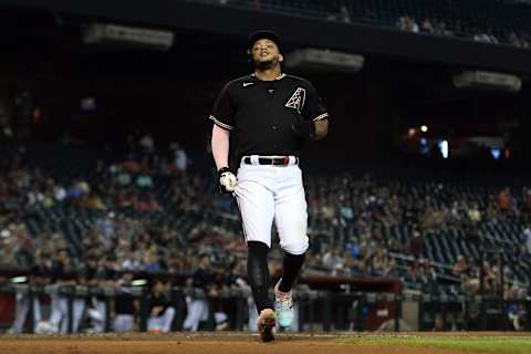 Sep 22, 2021; Phoenix, Arizona, USA; Arizona Diamondbacks second baseman Ketel Marte (4) scores a run against the Atlanta Braves during the first inning at Chase Field. Mandatory Credit: Joe Camporeale-USA TODAY Sports