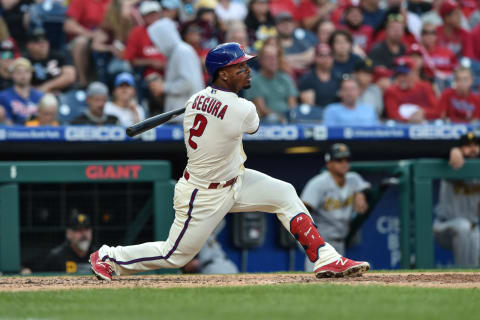 Sep 25, 2021; Philadelphia, Pennsylvania, USA; Philadelphia Phillies shortstop Jean Segura (2) hits a single to center field during the fifth inning of the game against the Pittsburgh Pirates at Citizens Bank Park. The Phillies won 3-0. Mandatory Credit: John Geliebter-USA TODAY Sports