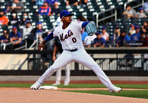 Sep 28, 2021; New York City, New York, USA; New York Mets starting pitcher Marcus Stroman (0) pitches against the Miami Marlins during the first inning of game one of a doubleheader at Citi Field. Mandatory Credit: Andy Marlin-USA TODAY Sports