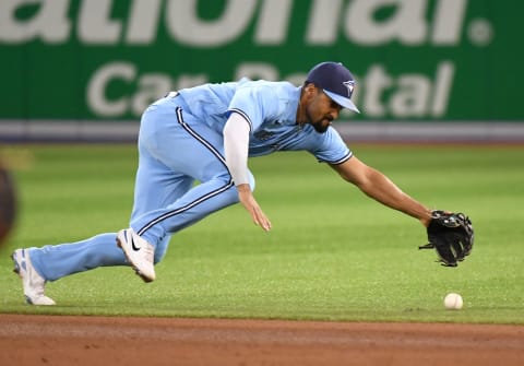 Oct 3, 2021; Toronto, Ontario, CAN; Toronto Blue Jays shortstop Marcus Semien (10) cannot field a ball hit for a single by Baltimore Orioles center fielder Cedric Mullins (not shown) in the fifth inning at Rogers Centre. Mandatory Credit: Dan Hamilton-USA TODAY Sports