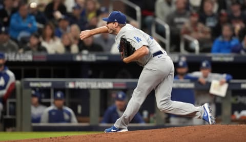 Oct 17, 2021; Cumberland, Georgia, USA; Los Angeles Dodgers starting pitcher Max Scherzer (31) pitching against the Atlanta Braves during the second inning in game two of the 2021 NLCS at Truist Park. Mandatory Credit: Dale Zanine-USA TODAY Sports