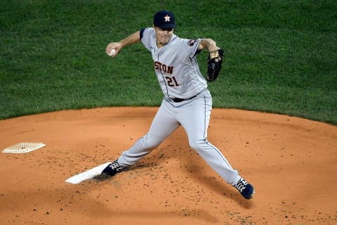 Oct 19, 2021; Boston, Massachusetts, USA; Houston Astros starting pitcher Zack Greinke (21) pitches against the Boston Red Sox during the first inning of game four of the 2021 ALCS at Fenway Park. Mandatory Credit: Bob DeChiara-USA TODAY Sports