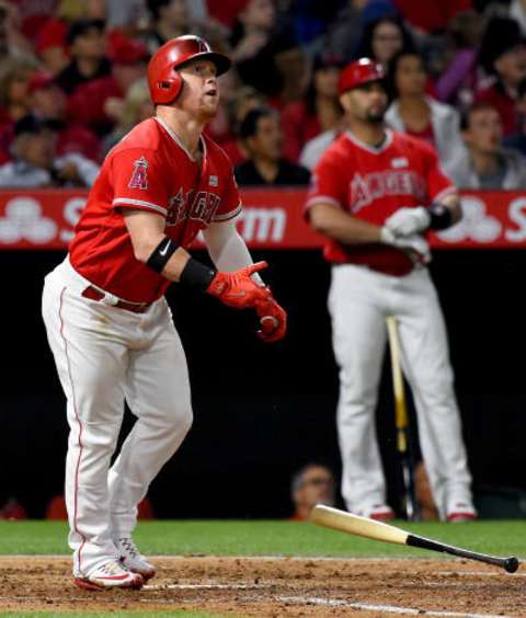 Los Angeles Angels right fielder Kole Calhoun hits a solo home run against the Minnesota Twins. Mandatory Credit: Jayne Kamin-Oncea-USA TODAY Sports