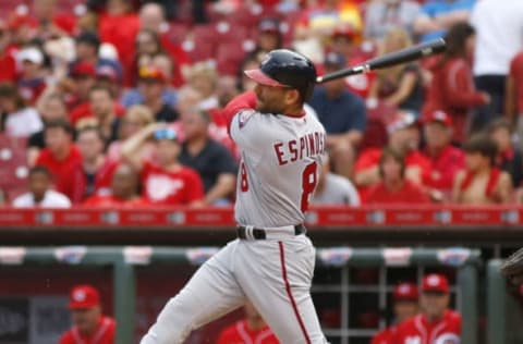 Washington Nationals shortstop Danny Espinosa hits a solo home run against the Cincinnati Reds during the eighth inning. Mandatory Credit: David Kohl-USA TODAY Sports