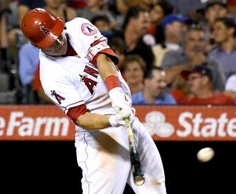 Aug 30, 2016; Anaheim, CA, USA; Los Angeles Angels center fielder Mike Trout (27) doubles in the fifth inning of the game against the Cincinnati Reds at Angel Stadium of Anaheim. Mandatory Credit: Jayne Kamin-Oncea-USA TODAY Sports