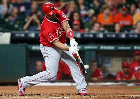 Sep 23, 2016; Houston, TX, USA; Los Angeles Angels designated hitter Albert Pujols (5) hits a double during the second inning against the Houston Astros at Minute Maid Park. Mandatory Credit: Troy Taormina-USA TODAY Sports