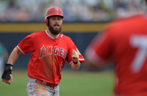 Mar 22, 2017; Peoria, AZ, USA; Los Angeles Angels second baseman Dustin Ackley (6) reaches third on a single by second baseman Rey Navarro (not pictured) during the second inning against the Seattle Mariners at Peoria Stadium. Mandatory Credit: Jake Roth-USA TODAY Sports