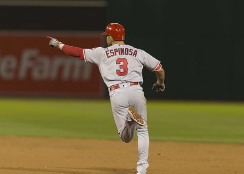 Los Angeles Angels second baseman Danny Espinosa celebrates as he rounds the bases after hitting the go ahead three run home run against the Oakland Athletics. Mandatory Credit: Neville E. Guard-USA TODAY Sports