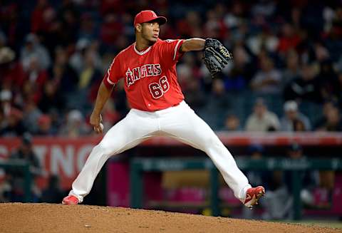 Los Angeles Angels relief pitcher JC Ramirez throws in the eighth inning against the Seattle Mariners. Mandatory Credit: Gary A. Vasquez-USA TODAY Sports