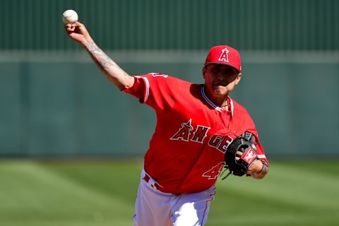 Los Angeles Angels pitcher Jesse Chavez throws against the Texas Rangers during a spring training game. Mandatory Credit: Matt Kartozian-USA TODAY Sports