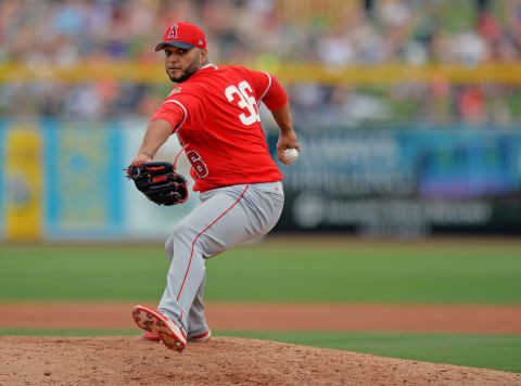 Mar 22, 2017; Peoria, AZ, USA; Los Angeles Angels pitcher Yusmeiro Petit (36) pitches during the third inning against the Seattle Mariners at Peoria Stadium. Mandatory Credit: Jake Roth-USA TODAY Sports