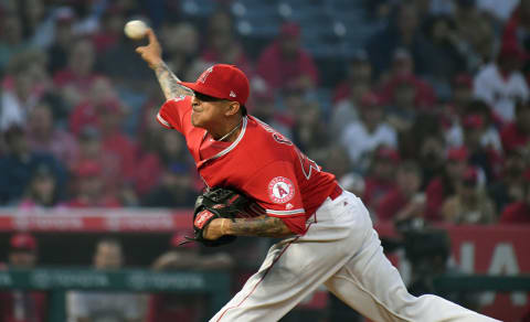 Los Angeles Angels starting pitcher Jesse Chavez pitches against the Seattle Mariners. Mandatory Credit: Richard Mackson-USA TODAY Sports