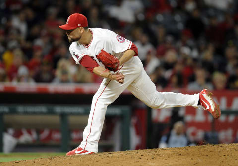 Los Angeles Angels starting pitcher Ricky Nolasco throws in the sixth inning against the Oakland Athletics. Mandatory Credit: Gary A. Vasquez-USA TODAY Sports