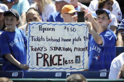 Aug 3, 2015; Toronto, Ontario, CAN; Blue Jays fan holds sign welcoming Blue Jays opening pitcher David Price (14) before game against Minnesota Twins at Rogers Centre. Mandatory Credit: Peter Llewellyn-USA TODAY Sports