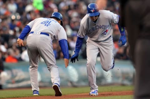 May 10, 2016; San Francisco, CA, USA; Toronto Blue Jays shortstop Troy Tulowitzki (2) is greeted by third base coach 