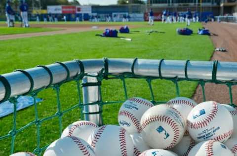 Mar 3, 2015; Dunedin, FL, USA; A general view of baseballs as Toronto Blue Jays players warm up on the field prior to a spring training baseball game against the Pittsburgh Pirates at Florida Auto Exchange Park. Mandatory Credit: Tommy Gilligan-USA TODAY Sports