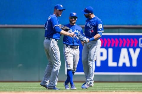 Blue Jays outfielders. Mandatory Credit: Brad Rempel-USA TODAY Sports