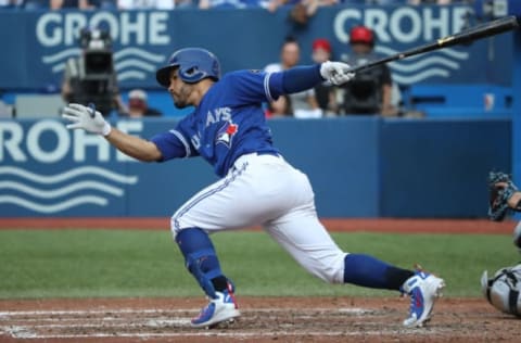 TORONTO, ON – AUGUST 11: Devon Travis #29 of the Toronto Blue Jays hits a single in the fifth inning during MLB game action against the Tampa Bay Rays at Rogers Centre on August 11, 2018 in Toronto, Canada. (Photo by Tom Szczerbowski/Getty Images)