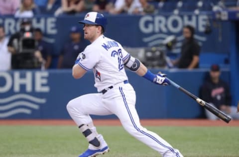 TORONTO, ON – SEPTEMBER 6: Billy McKinney #28 of the Toronto Blue Jays hits a single in the first inning during MLB game action against the Cleveland Indians at Rogers Centre on September 6, 2018 in Toronto, Canada. (Photo by Tom Szczerbowski/Getty Images)