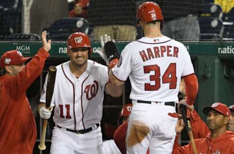 WASHINGTON, DC – SEPTEMBER 24: Bryce Harper #34 of the Washington Nationals celebrates with Ryan Zimmerman #11 after scoring in the first inning against the Miami Marlins at Nationals Park on September 24, 2018 in Washington, DC. (Photo by Greg Fiume/Getty Images)