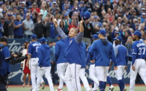 TORONTO, ON – SEPTEMBER 26: Manager John Gibbons #5 of the Toronto Blue Jays salutes the fans after their victory and his final home game as manager after their MLB game against the Houston Astros at Rogers Centre on September 26, 2018 in Toronto, Canada. (Photo by Tom Szczerbowski/Getty Images)