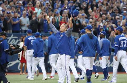 TORONTO, ON – SEPTEMBER 26: Manager John Gibbons #5 of the Toronto Blue Jays salutes the fans after their victory and his final home game as manager after their MLB game against the Houston Astros at Rogers Centre on September 26, 2018 in Toronto, Canada. (Photo by Tom Szczerbowski/Getty Images)