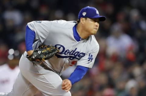 BOSTON, MA – OCTOBER 24: Hyun-Jin Ryu #99 of the Los Angeles Dodgers delivers the pitch during the first inning against the Boston Red Soxin Game Two of the 2018 World Series at Fenway Park on October 24, 2018 in Boston, Massachusetts. (Photo by Elsa/Getty Images)