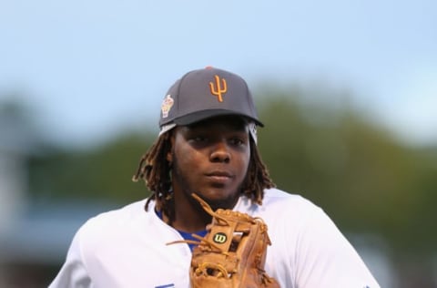 SURPRISE, AZ – NOVEMBER 03: AFL West All-Star, Vladimir Guerrero Jr #27 of the Toronto Blue Jaysruns into the dugout during the Arizona Fall League All Star Game at Surprise Stadium on November 3, 2018 in Surprise, Arizona. (Photo by Christian Petersen/Getty Images)