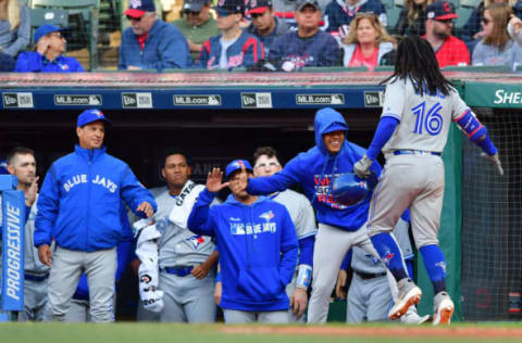 CLEVELAND, OHIO – APRIL 06: Freddy Galvis #16 of the Toronto Blue Jays celebrates with teammates after hitting a solo homer during the fifth inning against the Cleveland Indians at Progressive Field on April 06, 2019 in Cleveland, Ohio. (Photo by Jason Miller/Getty Images)