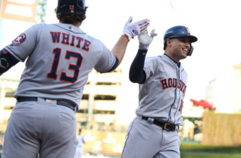 DETROIT, MICHIGAN – MAY 14: Aledmys Diaz #16 of the Houston Astros celebrates scoring a run in the second inning with Tyler White #13 while playing the Detroit Tigers at Comerica Park on May 14, 2019 in Detroit, Michigan. (Photo by Gregory Shamus/Getty Images)