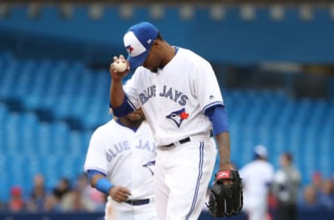 TORONTO, ON – JUNE 17: Edwin Jackson #33 of the Toronto Blue Jays reacts moments before being relieved in the second inning during MLB game action against the Los Angeles Angels of Anaheim at Rogers Centre on June 17, 2019 in Toronto, Canada. (Photo by Tom Szczerbowski/Getty Images)