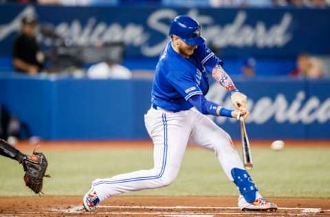 TORONTO, ONTARIO – JULY 5: Danny Jansen #9 of the Toronto Blue Jays hits a triple against the Baltimore Orioles in the second inning during their MLB game at the Rogers Centre on July 5, 2019 in Toronto, Canada. (Photo by Mark Blinch/Getty Images)