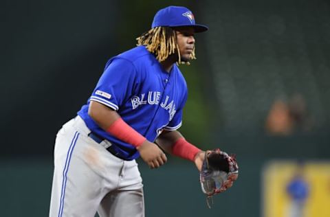 BALTIMORE, MD – AUGUST 01: Vladimir Guerrero Jr. #27 of the Toronto Blue Jays plays third base against the Baltimore Orioles at Oriole Park at Camden Yards on August 1, 2019 in Baltimore, Maryland. (Photo by G Fiume/Getty Images)