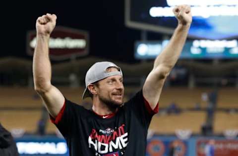 LOS ANGELES, CALIFORNIA – OCTOBER 09: Max Scherzer #31 of the Washington Nationals celebrates defeating the Los Angeles Dodgers 7-3 in ten innings to win game five and the National League Division Series at Dodger Stadium on October 09, 2019 in Los Angeles, California. (Photo by Sean M. Haffey/Getty Images)