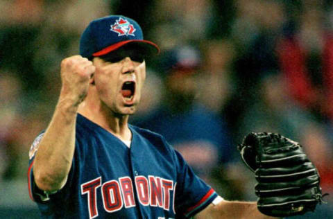 Toronto Blue Jays pitcher Pat Hentgen celebrates his three-hit shutout victory over the Minnesota Twins at Toronto’s Skydome 04 May. The Jays beat the Twins 1-0. AFP PHOTO/CARLO ALLEGRI (Photo by CARLO ALLEGRI / AFP) (Photo by CARLO ALLEGRI/AFP via Getty Images)