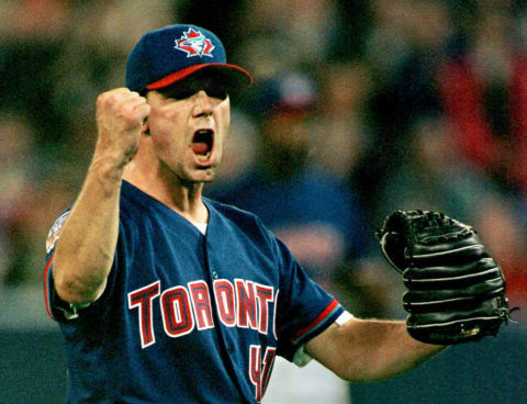 Toronto Blue Jays pitcher Pat Hentgen celebrates his three-hit shutout victory over the Minnesota Twins at Toronto’s Skydome 04 May. The Jays beat the Twins 1-0. AFP PHOTO/CARLO ALLEGRI (Photo by CARLO ALLEGRI / AFP) (Photo by CARLO ALLEGRI/AFP via Getty Images)